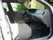 2001 Ford Crown Victoria - The interior of a 2001 Ford Crown Victoria is visible from the driver's side door.