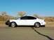 1999 Ford Taurus - This 1999 Ford Taurus is seen from the side, a black bra covering the front bumper.