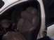 1999 Ford Taurus - Interior view of car seats and dashboard.
