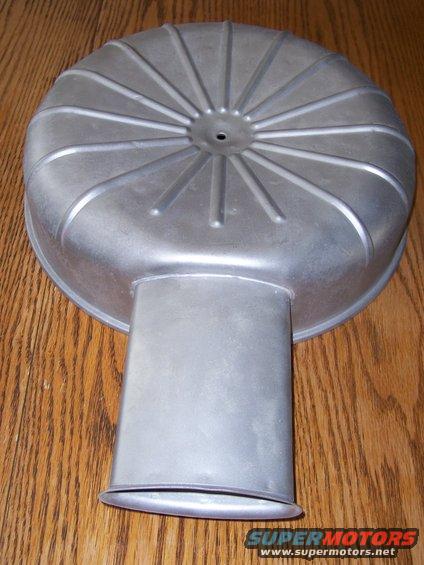 Aluminum air cleaner housing with radial fins and a rectangular intake tube