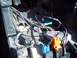 1994 Ford Probe - This image shows a complex automotive wiring harness with various colored wires and electrical connectors.