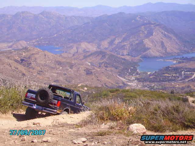 Cleghorn trail descenting, looking over silverwood lake. Chris in pic