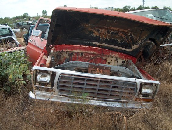 1979 Ford Bronco front view with hood open, red