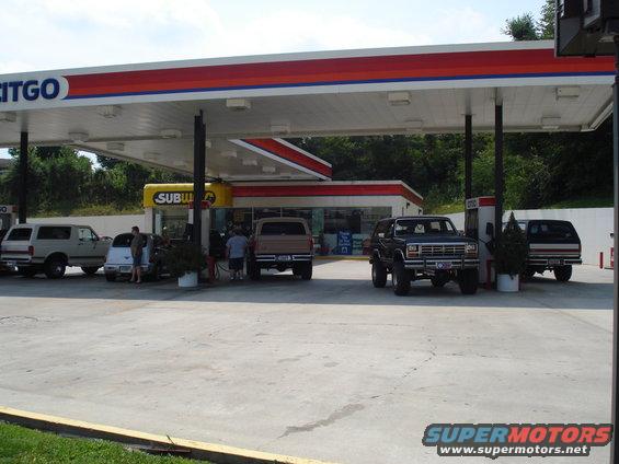 Black 1980 Ford Bronco parked at a Citgo gas station with other vehicles
