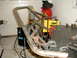 1991 Ford Bronco - Custom roll cage fabrication in progress, showing welded metal tubes and welding equipment.