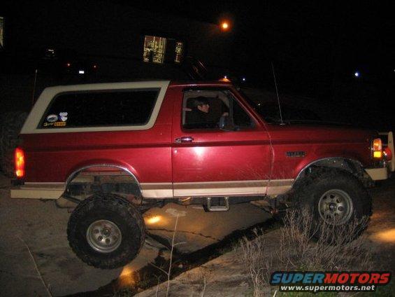 Red 1995 Ford Bronco side view