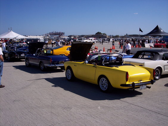 Yellow convertible sports car rear view