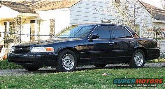 Black 1999 Ford Crown Victoria sedan, 3q front view