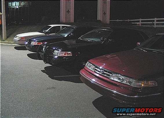 1999 Ford Crown Victoria front view, dark sedan