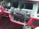 1992 Ford Crown Victoria - Interior view of a 1992 Ford Crown Victoria dashboard, with the radio assembly disassembled.