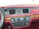 1992 Ford Crown Victoria - The dashboard of a 1992 Ford Crown Victoria shows a digital clock and an aftermarket radio unit.