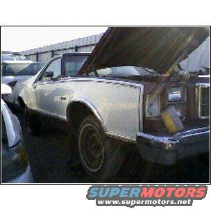 1973 Ford Ranchero with hood open, showing front quarter panel and headlight assembly