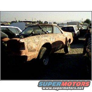 Rusty car in a junkyard, 3/4 front view