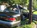 1999 Ford Crown Victoria - This Mercury Grand Marquis sustained major roof damage after colliding with a utility pole.