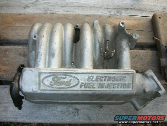 Aluminum intake manifold with Ford logo and "ELECTRONIC FUEL INJECTION" text