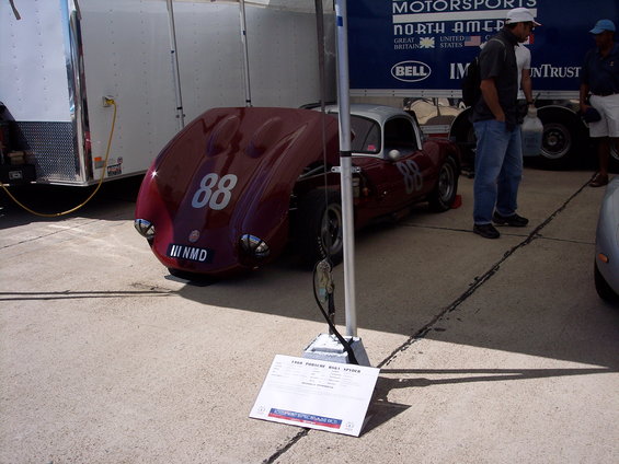 Red race car with number 88 and license plate III NMD