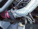 1992 Ford Crown Victoria - Aftermarket cold air intake system installed on a vehicle's engine.