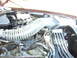 1992 Ford Crown Victoria - Close-up view of an engine bay, focusing on the cold air intake system and various engine components.