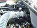 1992 Ford Crown Victoria - Close-up of an engine bay, focusing on the cold air intake system and associated engine components.