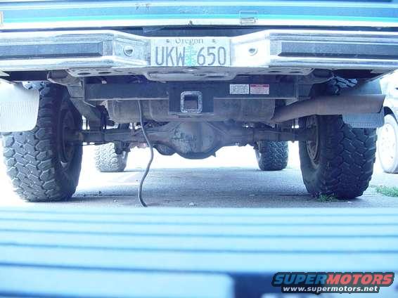 Truck rear bumper with Oregon license plate UKW 650, trailer hitch, and exhaust pipe