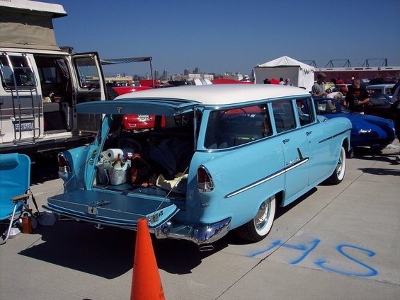 Light blue 1955 station wagon, rear view, tailgate open