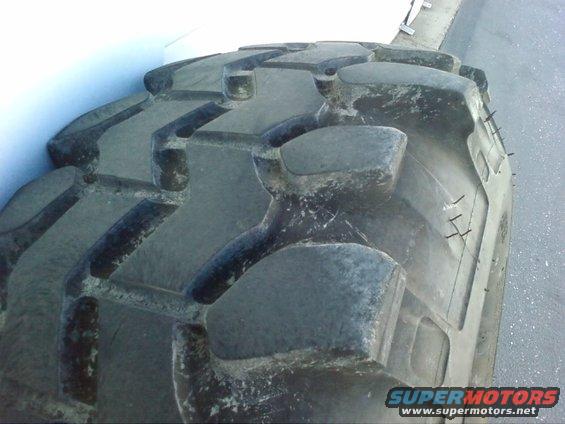 Close-up of a large off-road tire tread pattern