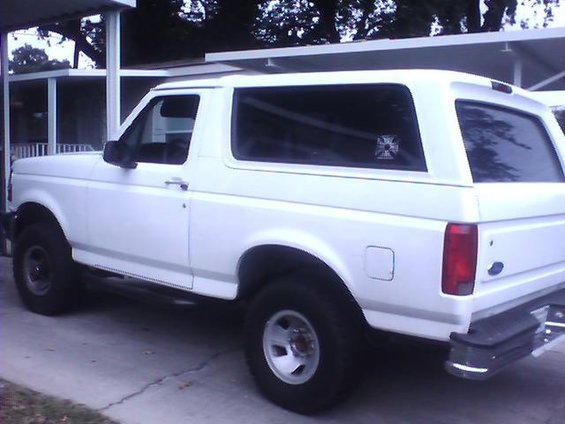 1989 Ford Bronco, side view, white paint, aftermarket wheels