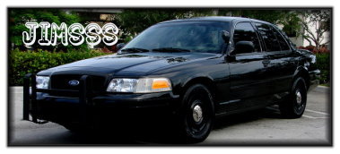 Black police car with a push bar and steel wheels. Text "JIMSSS" is on the windshield