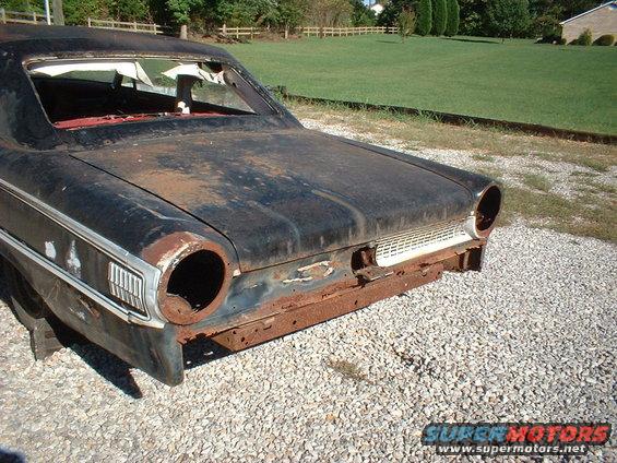 1963 Ford Galaxie rear, black, rusty, missing taillights and bumper