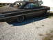 1963 Ford Galaxie - This rusty 1963 Ford Galaxie 500 is parked on a gravel lot next to another vehicle.
