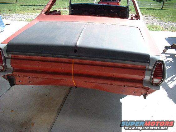 1967 Mercury Cyclone rear with black trunk lid and orange body