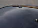 2003 Ford Crown Victoria - Car roof detail showing a black antenna pod.