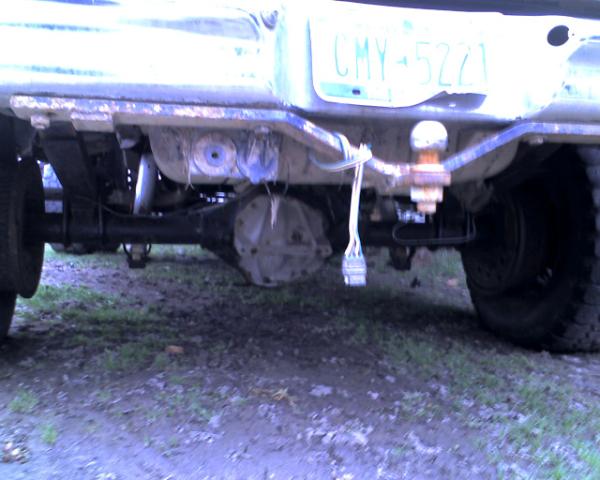 Rear axle and trailer hitch with license plate CMY-5221