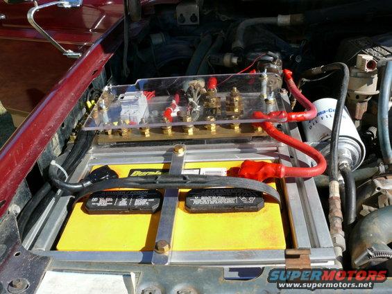 Engine bay with dual batteries and custom wiring harness