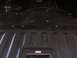 1978 Ford Bronco - The underside of a vehicle is shown, with several pieces of tape applied to various points.