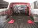 1978 Ford Bronco - The interior of a vehicle is shown during a renovation, with exposed metal and plastic-covered components visible.