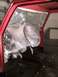 1978 Ford Bronco - Vehicle interior covered in plastic sheeting, likely during a restoration or painting process.