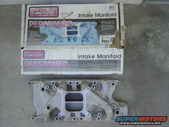 Edelbrock Performer intake manifold with its box. The box has "Intake Manifold" and "PERFORMER" text