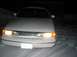 1996 Ford Crown Victoria - Front view of a 1995 Ford Crown Victoria parked in the snow at night.