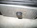 I had to devise a way so that the leaf center bolt would be able to fit into the stock shim
