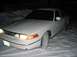 1996 Ford Crown Victoria - A 1996 Ford Crown Victoria is seen from the front 3/4 angle, parked in a snowy environment.