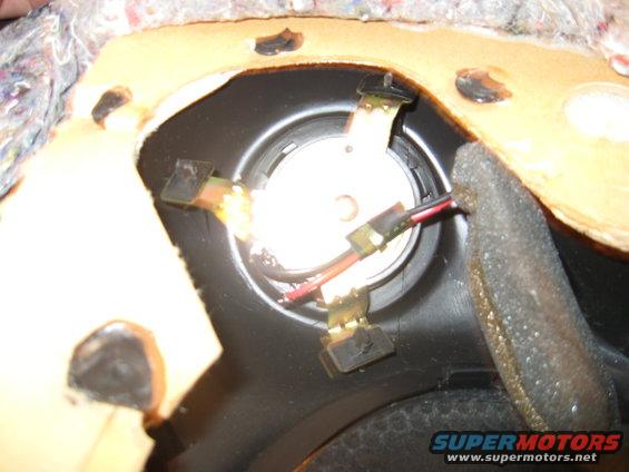 Car door speaker with exposed wiring and mounting clips
