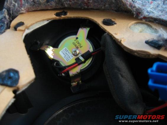 Car door speaker with part number REV01 P0405 and other markings