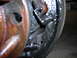 1995 Ford F-250 - Close-up view of a greasy brake drum assembly, showing springs and brake shoes.