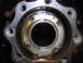 1995 Ford F-250 - Greasy wheel hub assembly showing a bearing retainer ring.