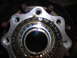 1995 Ford F-250 - Close-up view of a wheel bearing assembly, showing the internal rollers and lubricant.