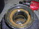 1995 Ford F-250 - Differential housing and an impact wrench are shown in this close-up view. The Supermotors.net logo is visible.