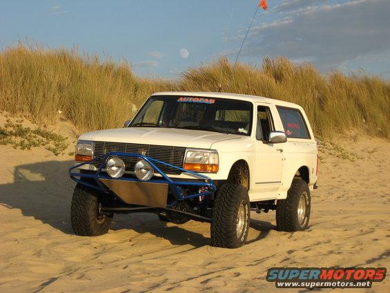img_0040.jpg Bronco on the beach at sunset