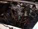 1992 Ford Ranger - Engine bay of a 1992 Ford Ranger shows a V6 engine with various hoses and wiring.