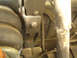 1994 Chevrolet Silverado 3500 - Close-up view of a truck's suspension system, showing an air spring and shock absorber.